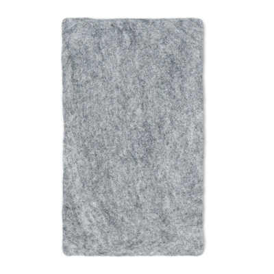 Light grey rectangular felted wool cat carrier cushion on a white background.