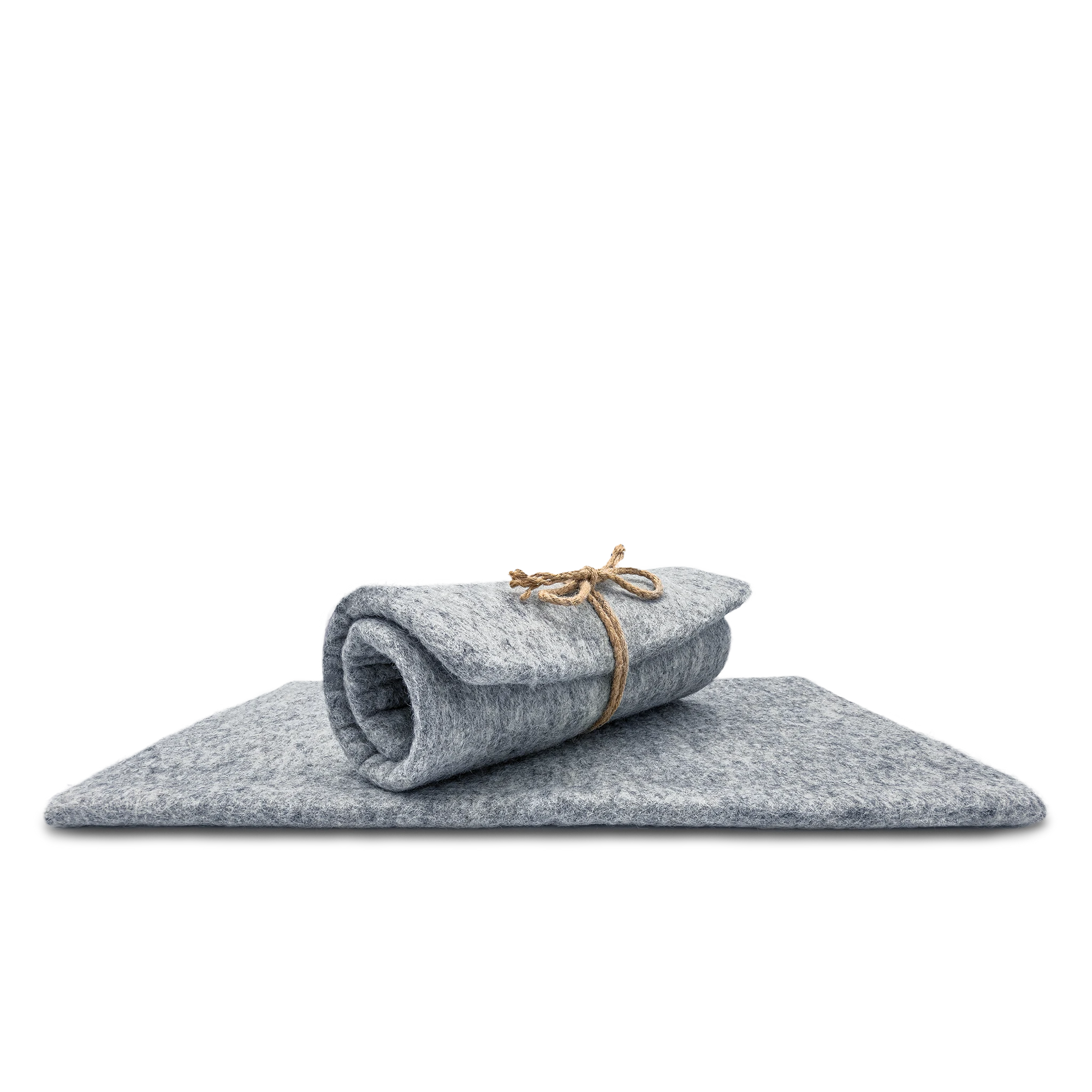 Light grey rectangular felted wool cat carrier cushion rolled and tied with twine on top of a flat pad.