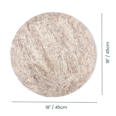A round, felted wool cat mat with dimensions.