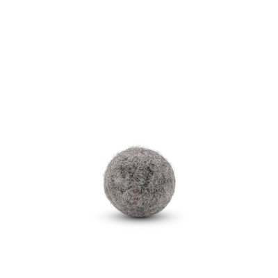 Single brown felted wool ball cat toy on a light background.