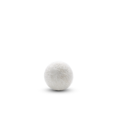 Single white felted wool ball cat toy on a light background.
