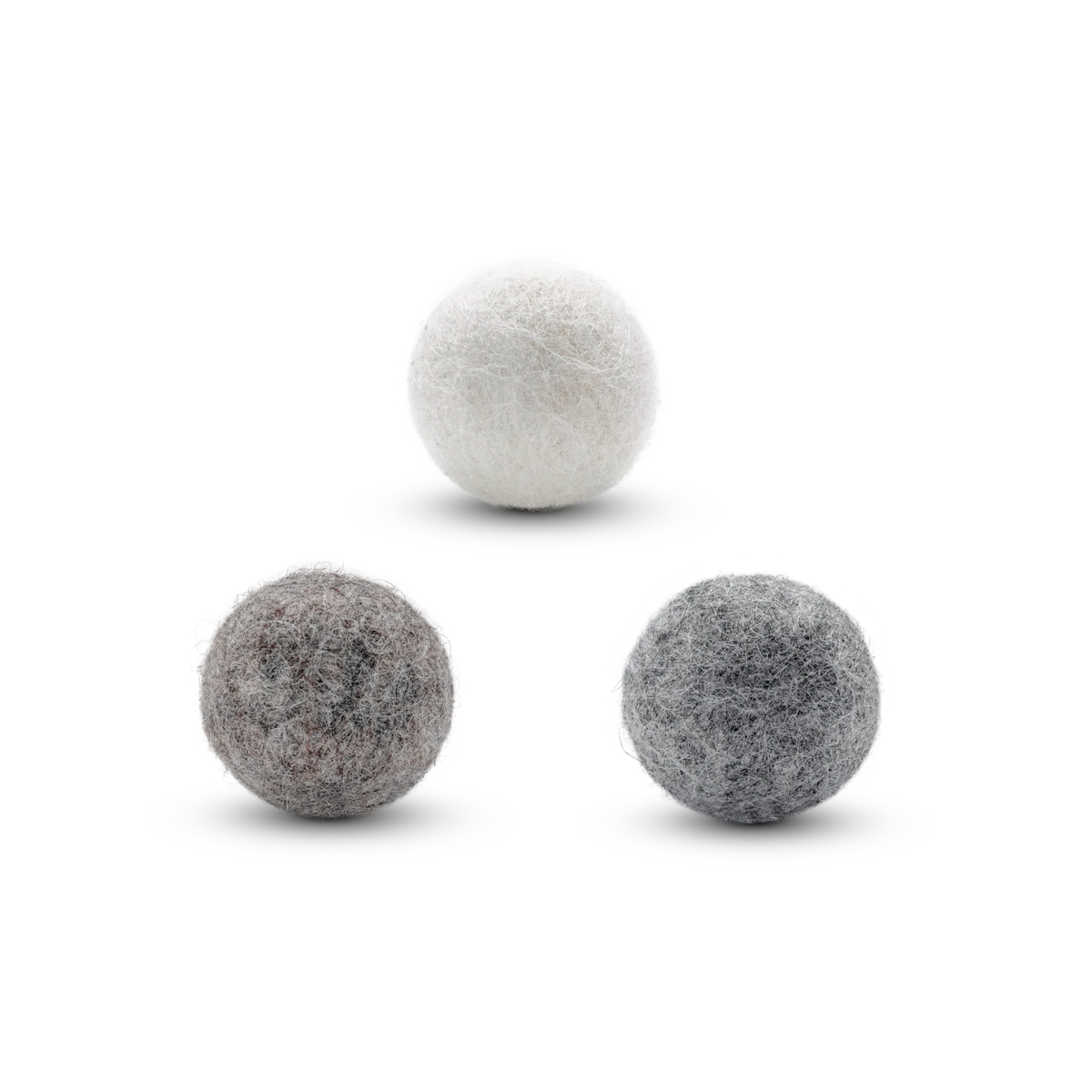 Three felt wool cat toy balls in white, gray, and brown tones arranged in a triangle on a clean white background.