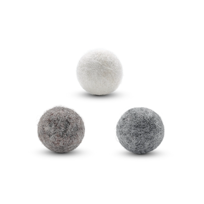 Three felt wool cat toy balls in white, gray, and brown tones arranged in a triangle on a clean white background.
