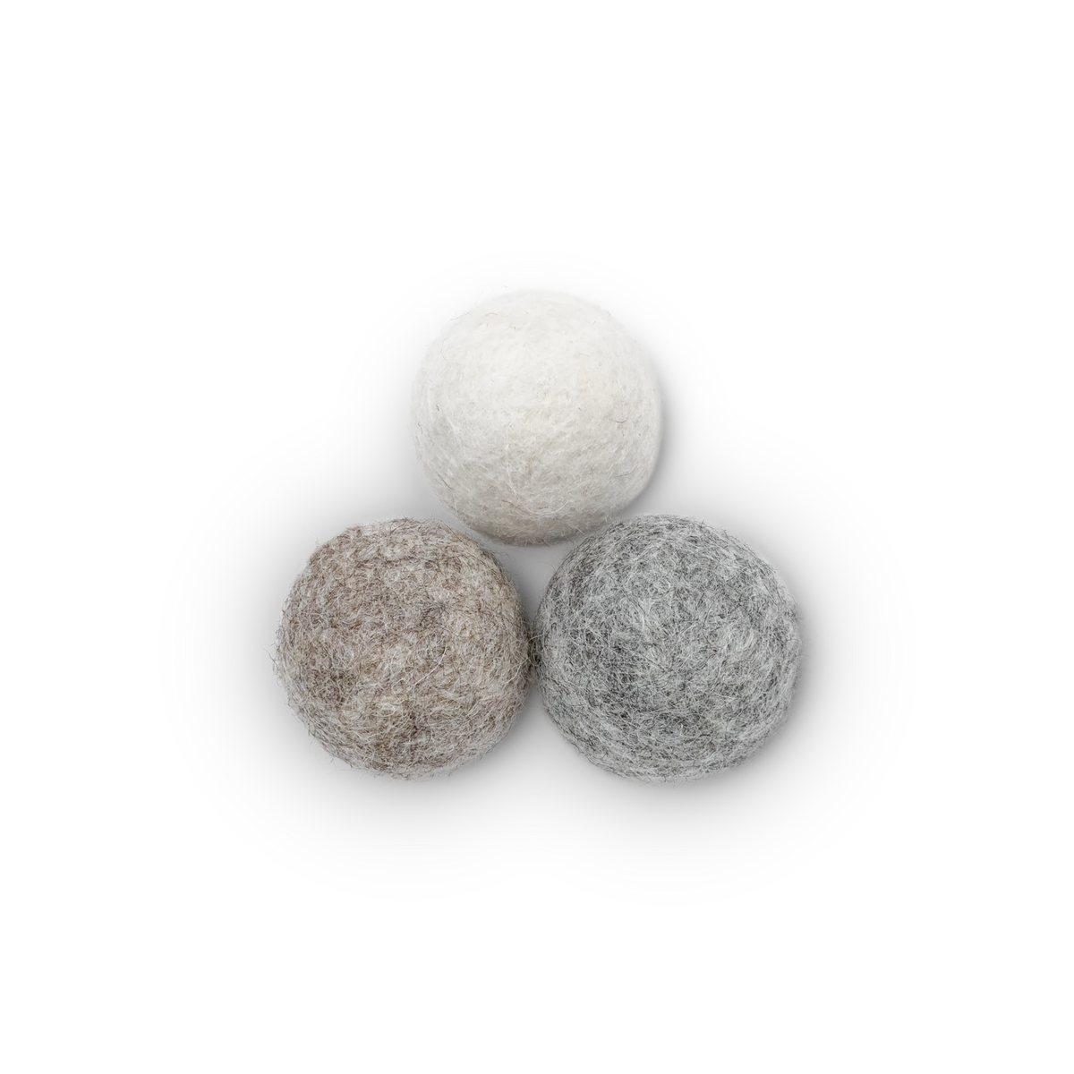 Three textured wool felt cat toy balls in off-white, light brown, and light gray, arranged in a triangle on a white background.