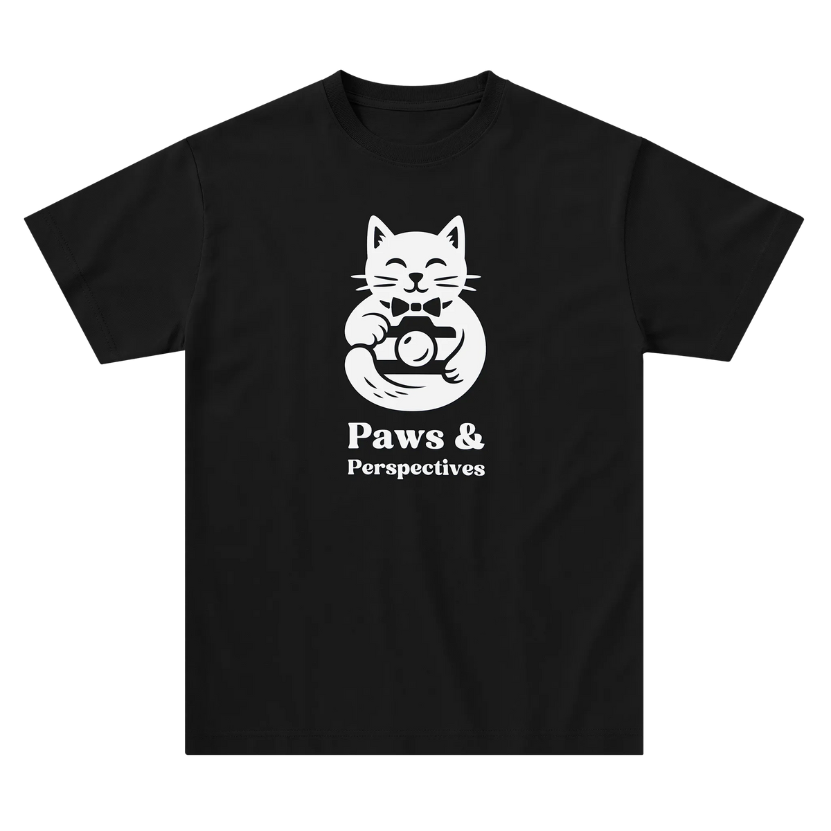 Black Paws & Perspectives cat graphic t-shirt laid flat on a light background.